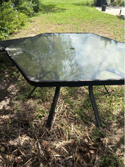 Glass top patio table Glass top patio table