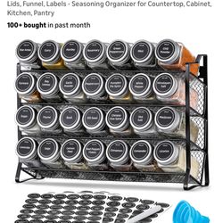 New 28 jar spice rack with labels, funnel, and marker
