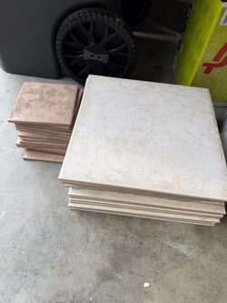 FREE tiles 13.5"x13.5" 16 pieces and some small ones