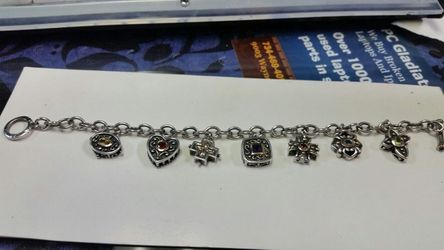 .925 sterling silver marked with genuine gemstones and 14 karat gold overlay charm bracelet