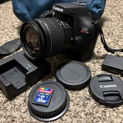 Canon EOS Rebel T100 + Lens DSLR Camera