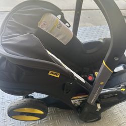 Doona Car Seat Stroller  With Base