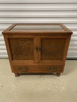 Wooden Cabinet with Asian Carved Designs