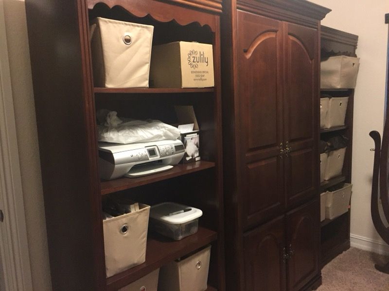 Entertainment center. Or excellent for storage. Beautiful dark wood. Very heavy