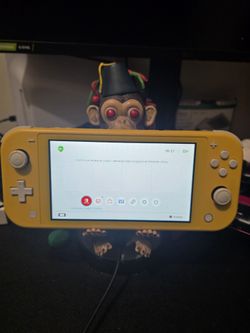Nintendo Con Un Juego Y Cargador