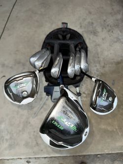 TUNER IRONS, WOODS AND DRIVER AND NIKE GOLF BAG