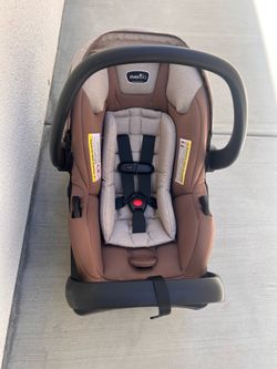 $75  Evenflo- Car seat and base - unused