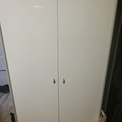 Storage Cabinet AN ALSO HANGIN CLOTHES CLOSET