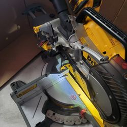 For Sale A Used DEWALT 60V Lithium-Ion 12in Cordless Sliding Miter Saw.  Tool-only Model DCS781 