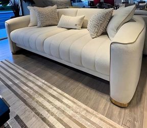Luxury Cream Channel-Tufted Sofa with Gold Legs