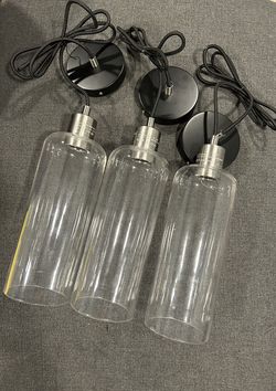 Lot of 3 pendants New no box comes as shown with 60 inch of overall height. Bulbs not included 