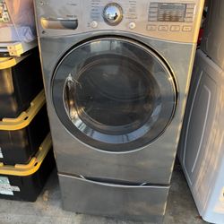 Lg Steam  Gas dryer  Excellent working condition  Heavy duty  W27 D31 H53 including pedestal 7.3 cu ft 3  months warranty parts and labor only  I can 