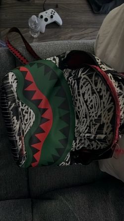 Spray ground backpack
