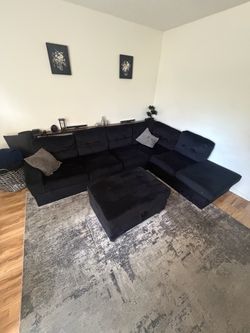 Sectional sofa with storage ottoman