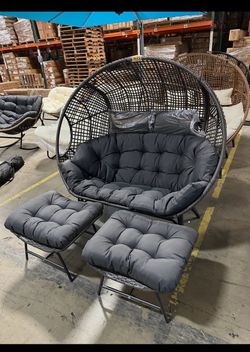 New assembled double eggs chair with 2 footrest ottoman dark gray cushion.