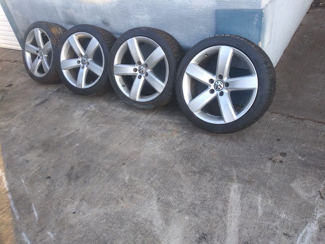Set of wheels and tires for Volkswagen cc, tire size is 235/40/18 in good condition; please call or text {contact info removed}