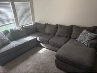 Sectional from Rooms To Go (Gray)