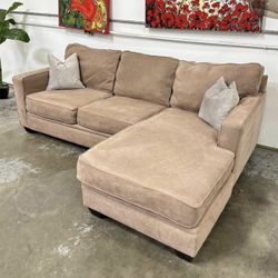 Beige Raymour & Flanigan Sectional Sofa with Reversible Chaise