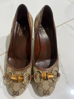 Size 6B authentic Gucci Monogram Horsebit pumps