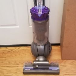 NEW cond DYSON  DC65  ANIMAL VACUUM  ,   WITH ATTACHMENTS. , WORKS EXCELLENT. , AMAZING POWER SUCTION. , IN THE BOX. , 