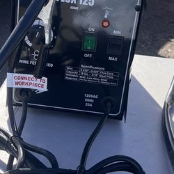 Selling welder with helmet