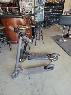 2 electric scooters