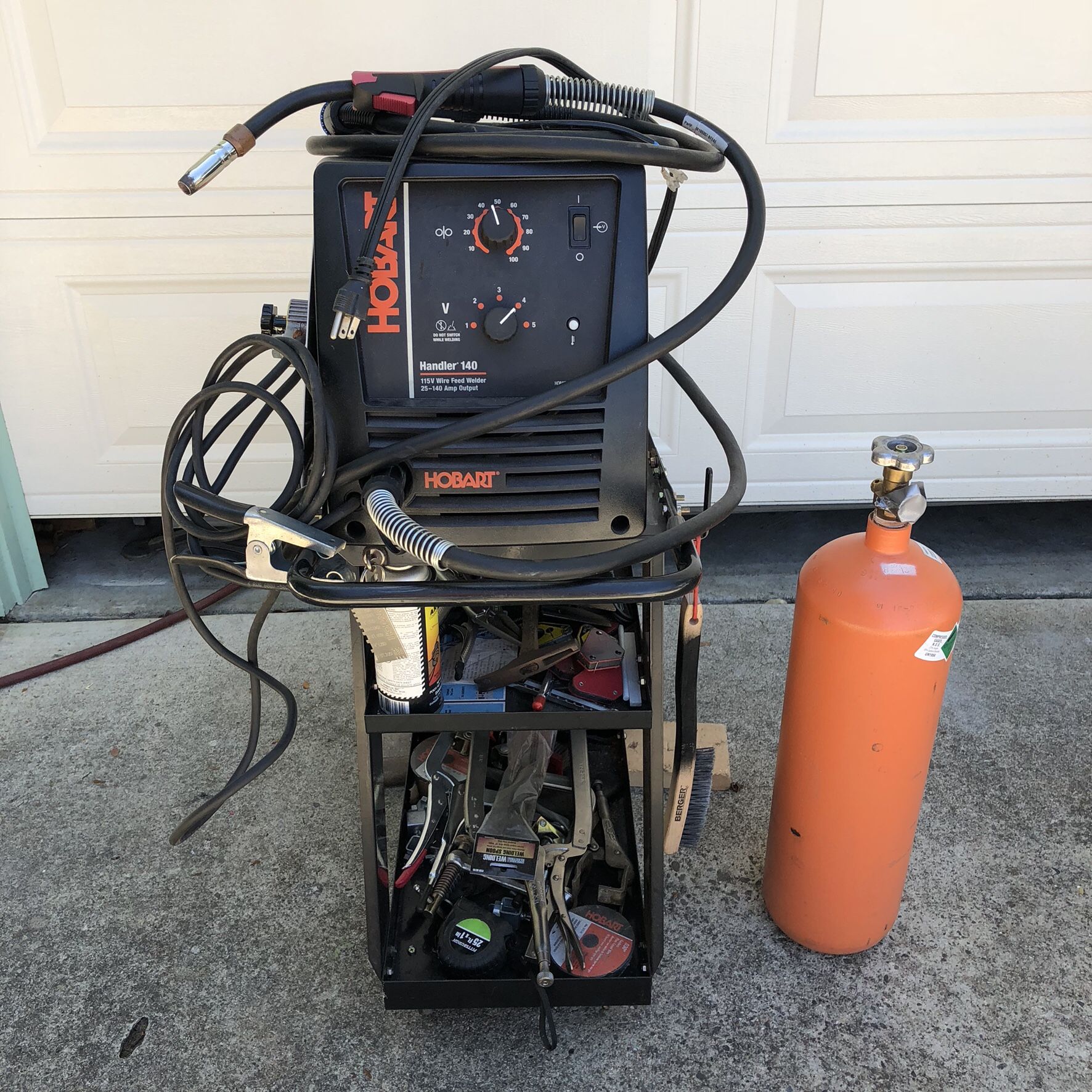 Hobart Handler 140 MIG Welder with cart, gas tank, regulator, ready to weld