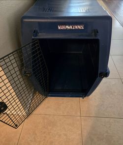 XL Deluxe Vari Kennel blue hard-plastic pet kennel crate.