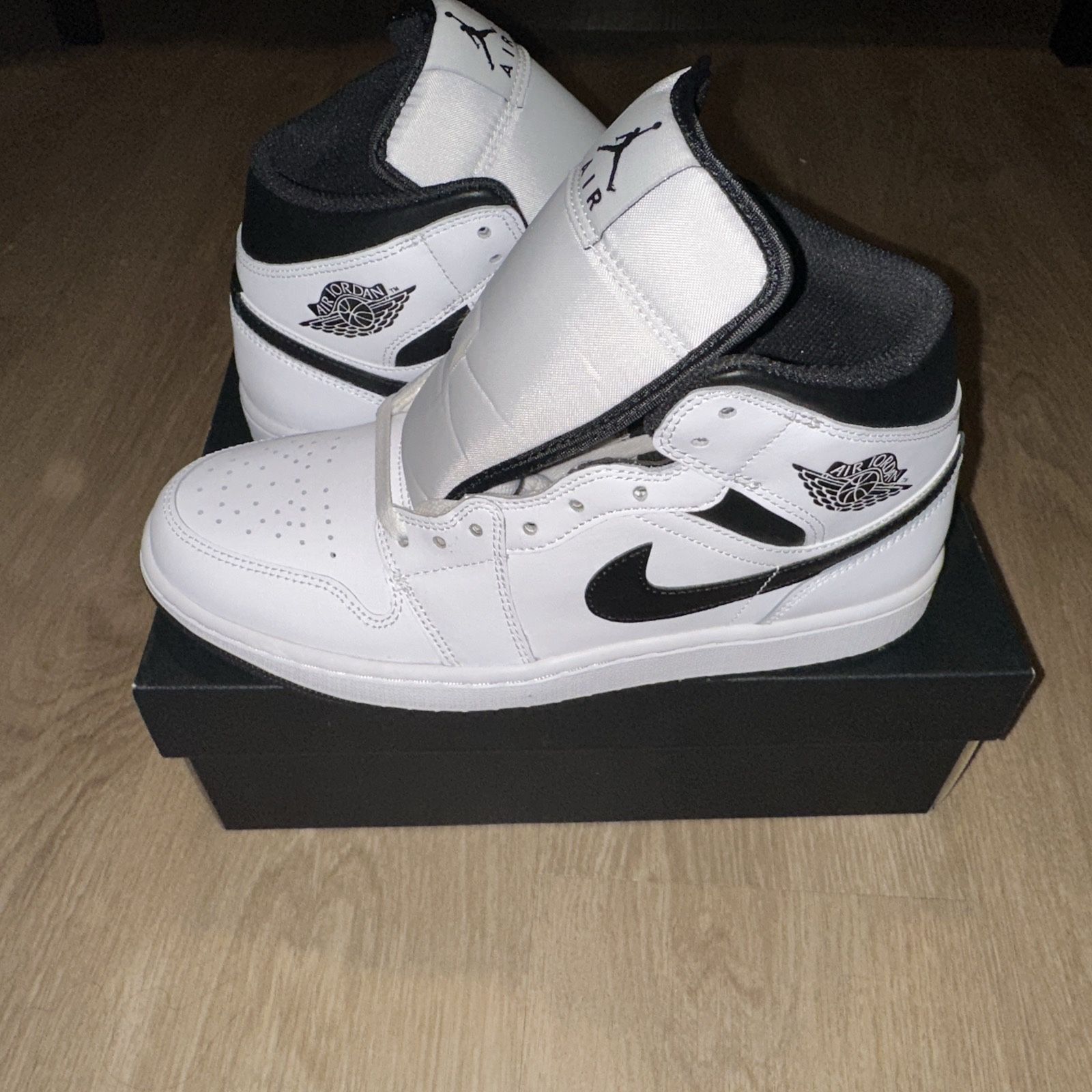 Jordan’s 1 Mid White And Black Shoe