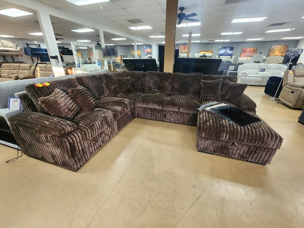 Famous Viral SECTIONAL WITH SLEEPER AND CHAISE WITH STORAGE. NOW IN STOCK