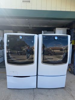 LG Front Load Double Washer and Electric Dryer Set with Pedestals