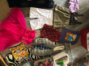 Photo Girls clothes the jeans are size 8 the shorts are size 1012 the dress is size small but it fits probably a 10 to 14-year-old the cute T-shirt is for