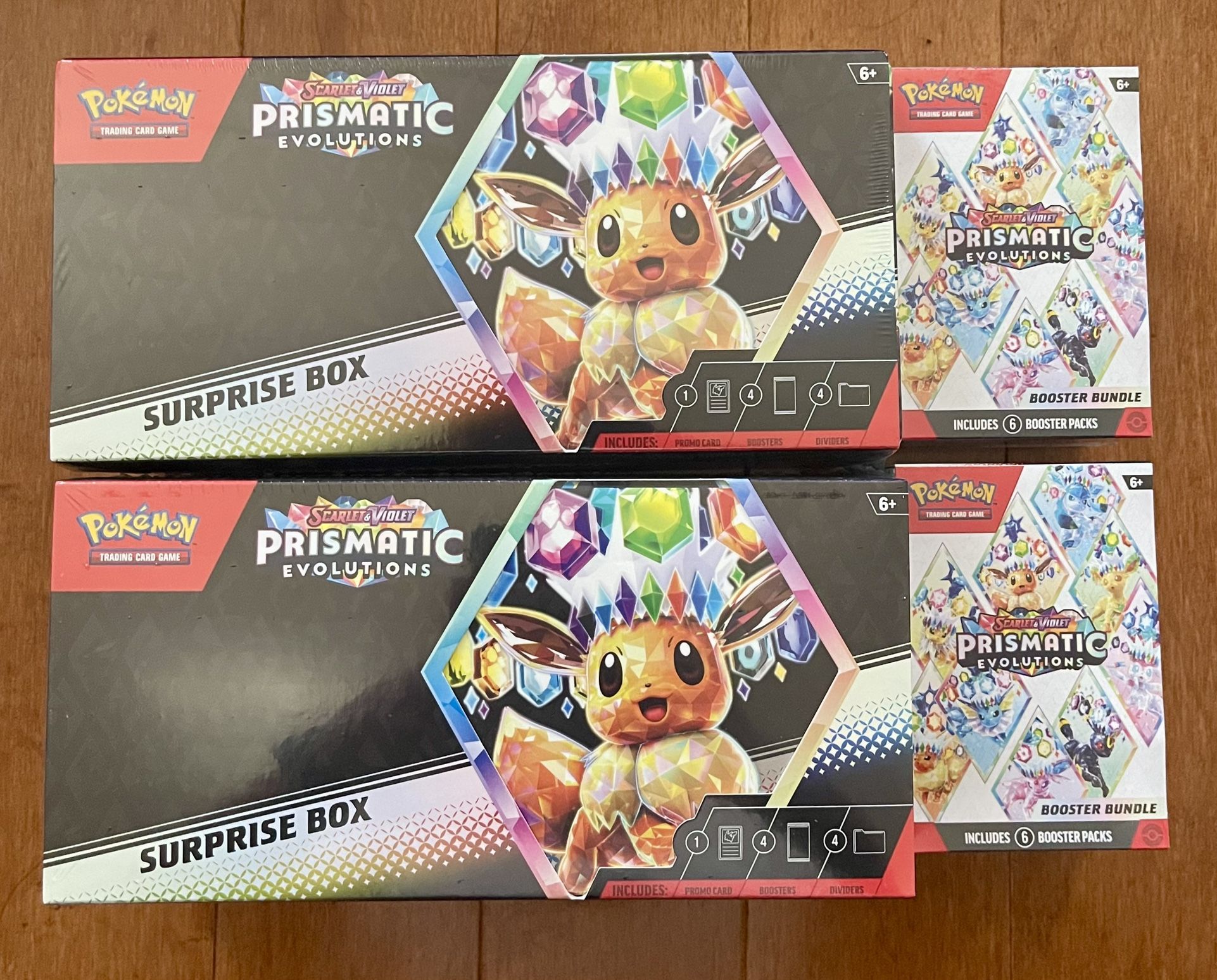 Pokémon Prismatic Evolutions Surprise Box and Booster Bundle