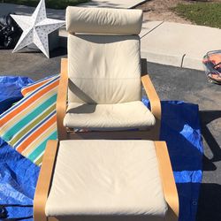Chair with foot rest.
