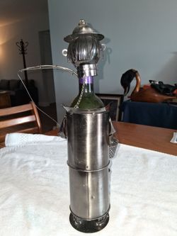 EBROS Camper fisherman. Handmade Metal wine bottle holder.