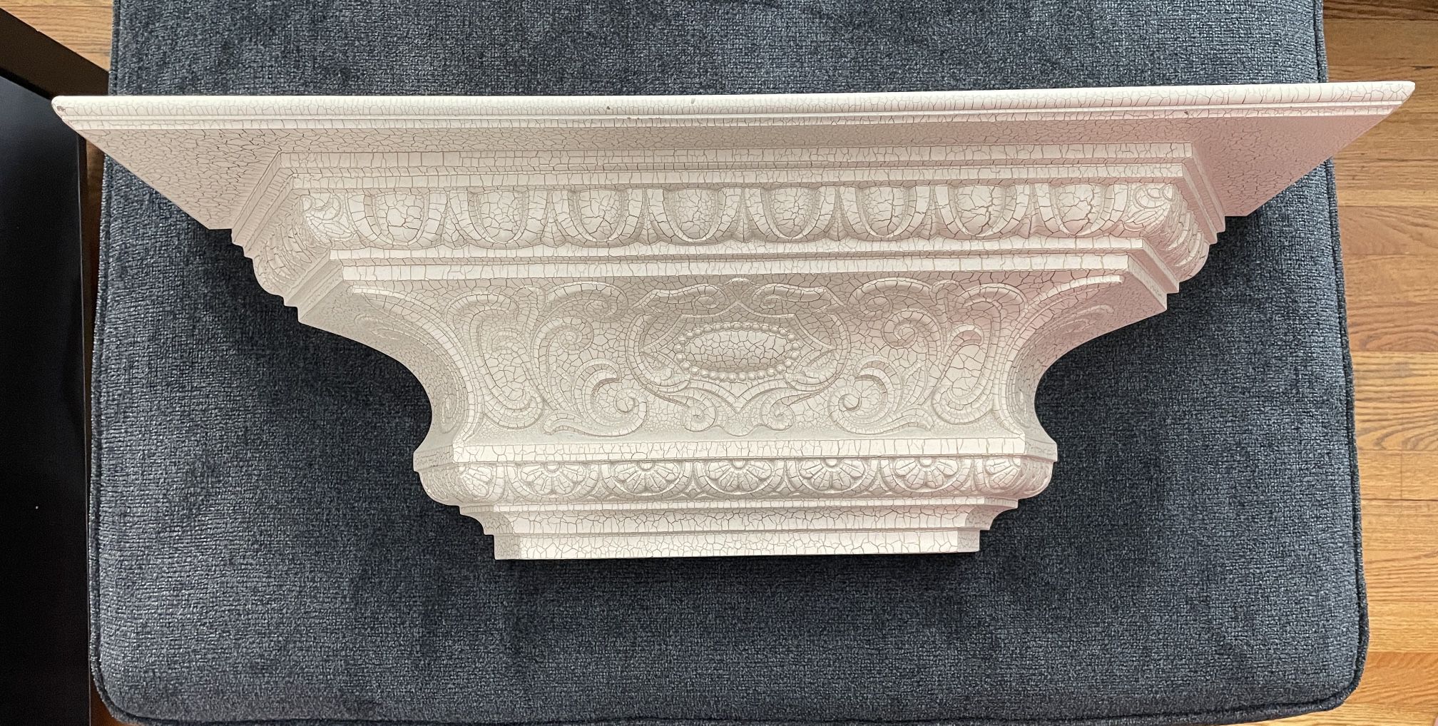 Decorative Beige Shelf with Carved Design