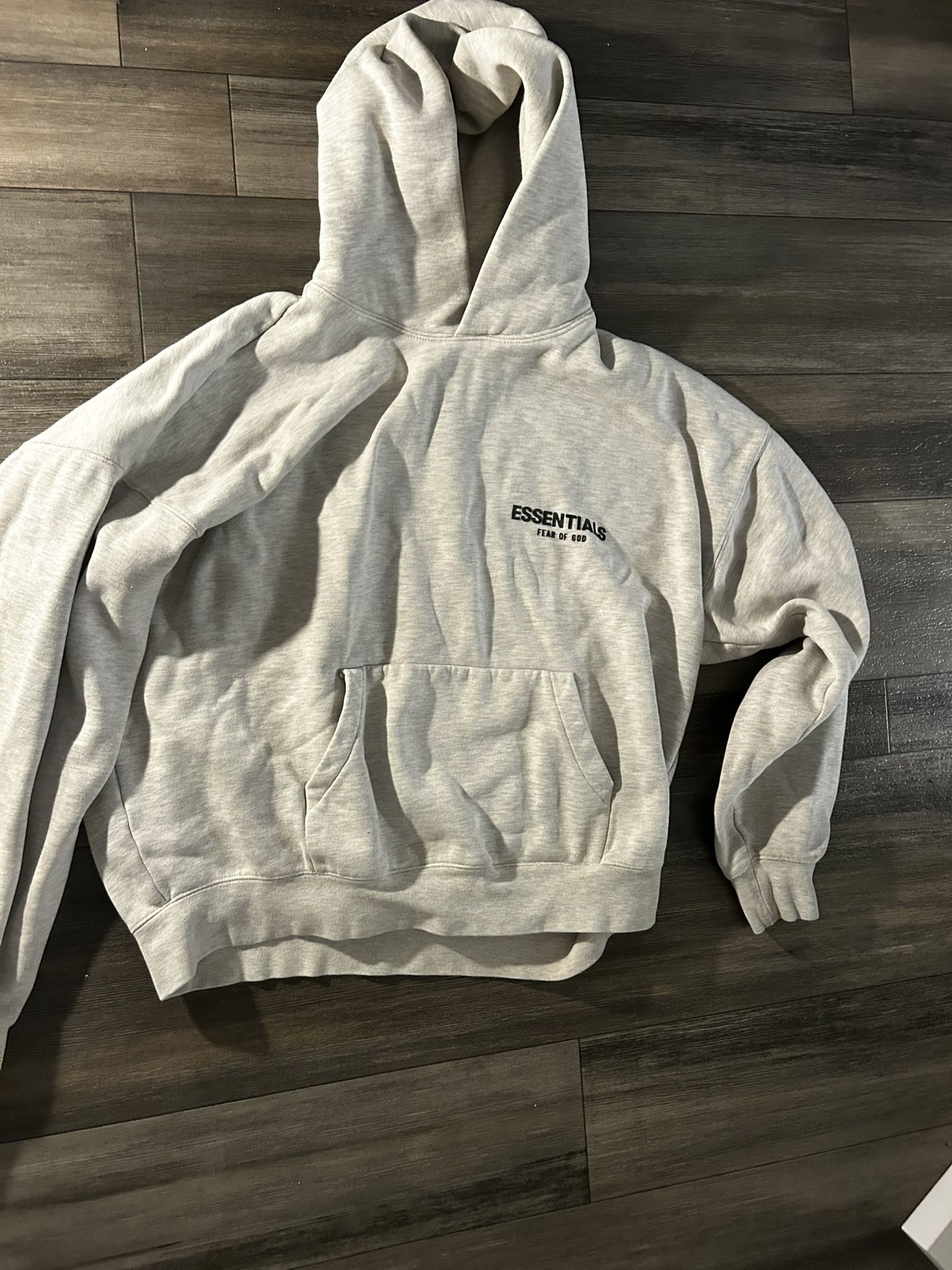 Fear of God Essentials grey hoodie