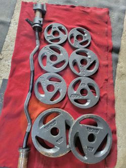 2" HOLE EZ-CURL BAR WITH 100LBSs OLYMPIC PLATES  2-25s  2-10s  2-5s  2-2.5s 
11525 S HALSTED/7111.S WESTERN 
120$  CASH ONLY AS IS