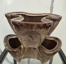 Pocketed planter pot. Looks new $55 Approx 8 in tall and 11 inch across longest