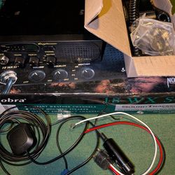 Firm $50 Cobra 18 WX ST mobile CB radio with a SoundTracker system and NOAA weather channels.