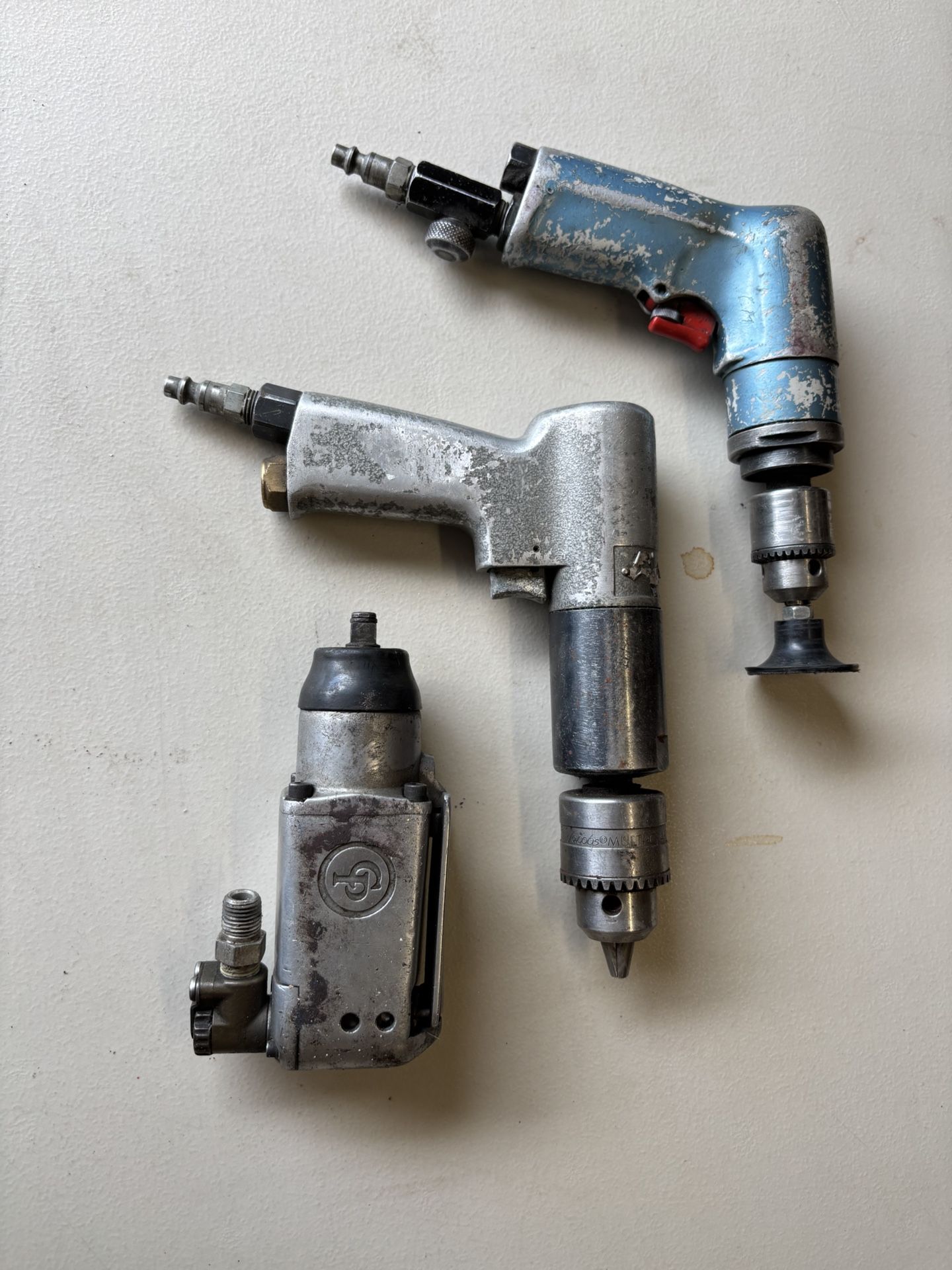 Two Pneumatic Items The Two On The Left Of Photo