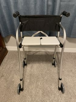 walker with pockets and board