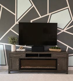 Entertainment center with electric fireplace