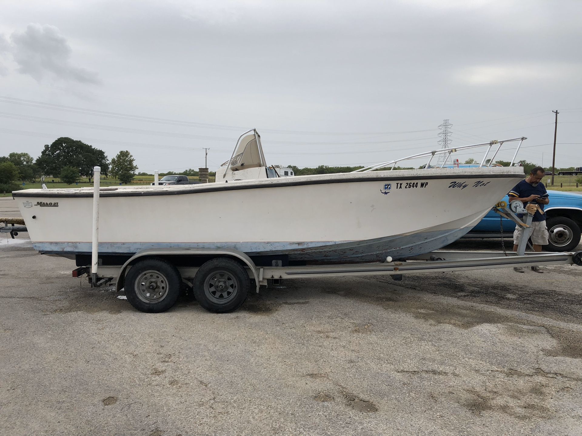 21 ft classic mako for sale. Comes with aluminum trailer no motor. It is a project boat with great potential.
