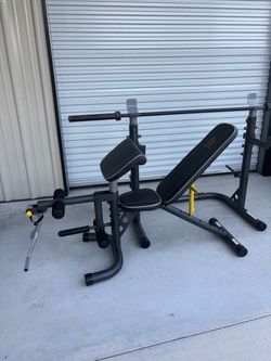 Golds Gym Adjustable Bench, rack and cap 45Lb Olympic barbell 7ft $200