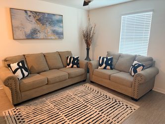Ashley Furniture Sofa, rug, frame, tall vase