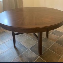 round wood dining table 