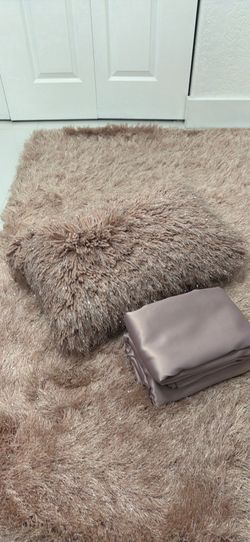 Carpet, pillow and curtain