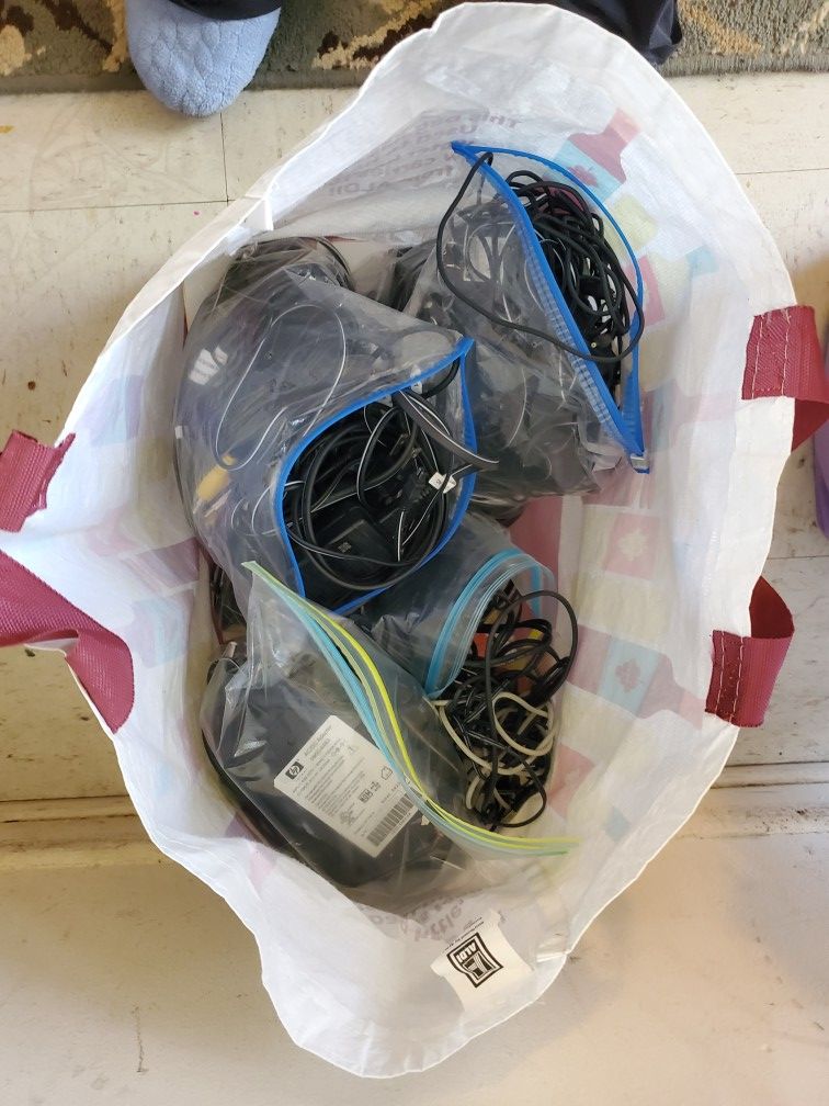 Bag of different chargers and electric cords