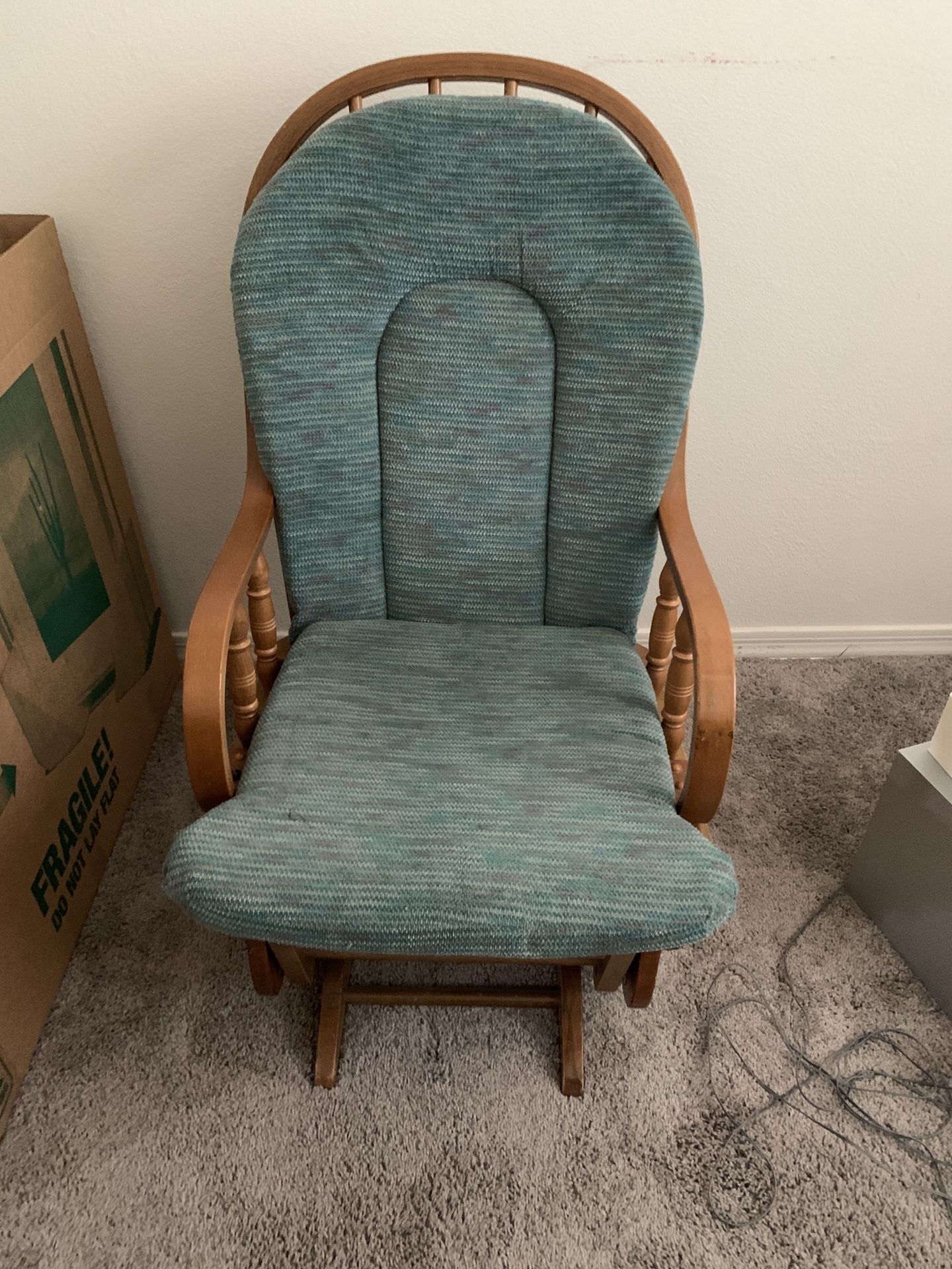 Rocker gliding chair in good condition. 